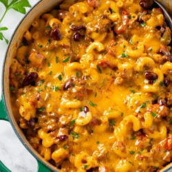A Dutch oven filled with Cheesy Chili Mac.
