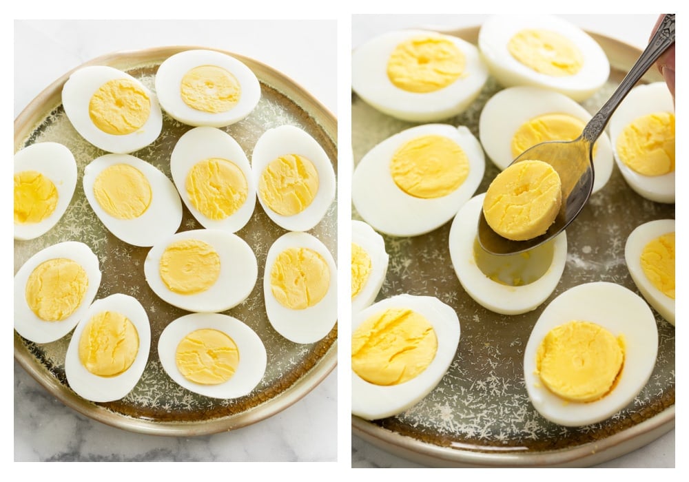 Taking the yolk out of halved hard boiled eggs to make deviled eggs.