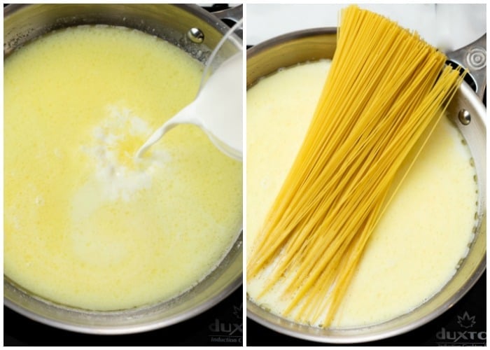 A skillet with cream and pasta being added to make Garlic Parmesan Pasta