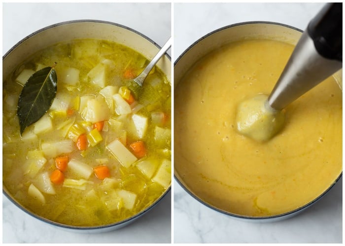 An immersion blender blending vegetables, potatoes, and broth for Potato Leek Soup.