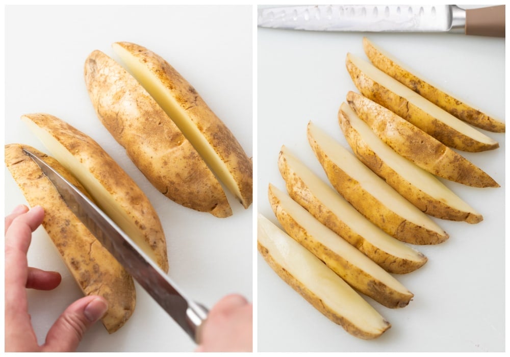 Cutting a russet potato into wedges to make baked potato wedges.