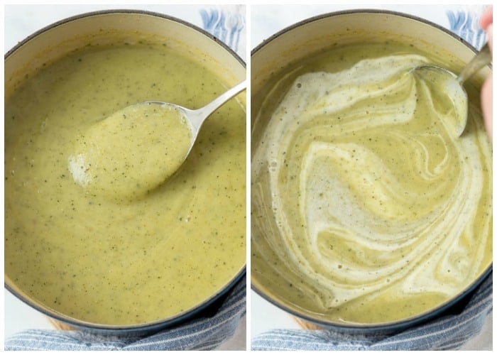 Zucchini soup in a pot after being blended and adding cream in.