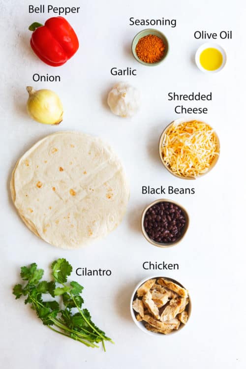 Overhead view of ingredients needed for chicken quesadillas.