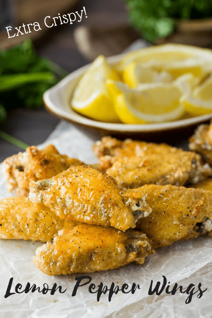 These lemon pepper wings are extra crispy and brushed with a simple combination of lemon and butter, then topped with freshly ground pepper. This post also includes tips on how to perfectly grill, bake, and fry the perfect crispy chicken wing. #chickenwings #wings #chicken #lemonpepper #lemon #appetizers #friedchicken #bakedchicken #grilledchicken #grilling #meat #partysnacks